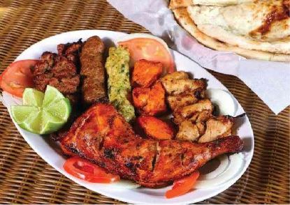 Picture of Family Deal 1: 1 Chicken Tikka, 1 Chicken Kabab, 2 Naan, 1 Cold Drink Regular, Raita + Chatni