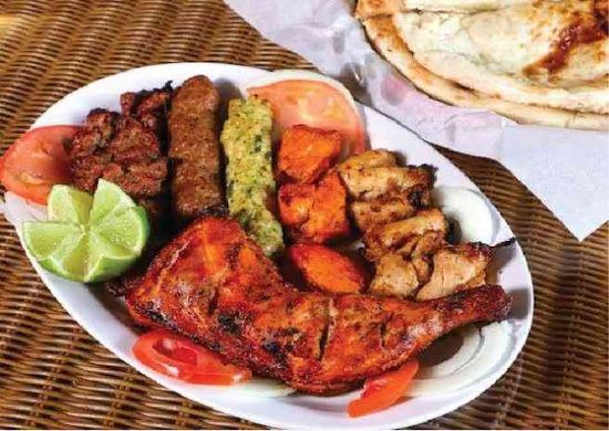 Picture of Family Deal 1: 1 Chicken Tikka, 1 Chicken Kabab, 2 Naan, 1 Cold Drink Regular, Raita + Chatni