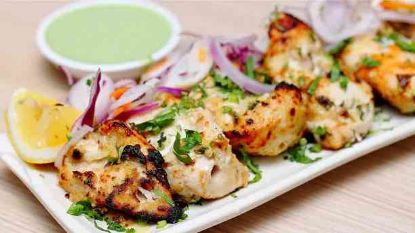 Picture of Family Deal 3 : 1 Malai Boti, 1 Chicken Kabab, 2 Naan, 1 Cold Drink, Raita + Chatni