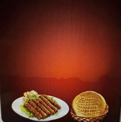 Picture of Deal 1 : 10 Chicken Kabab, 3 Naan, Drink 345 ml, Raita + Chatni